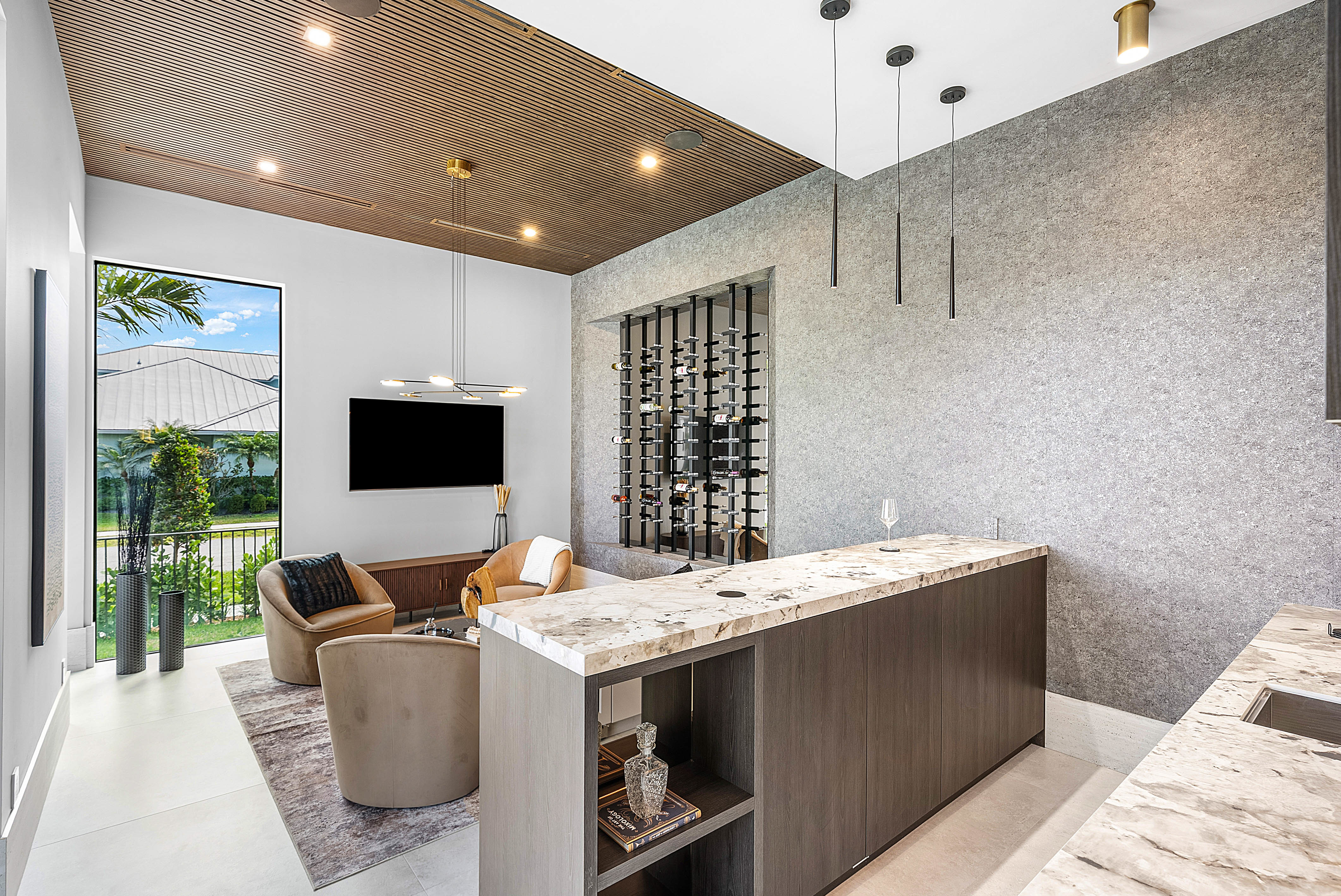 Glass-enclosed wine room with bottle display by RG Glass