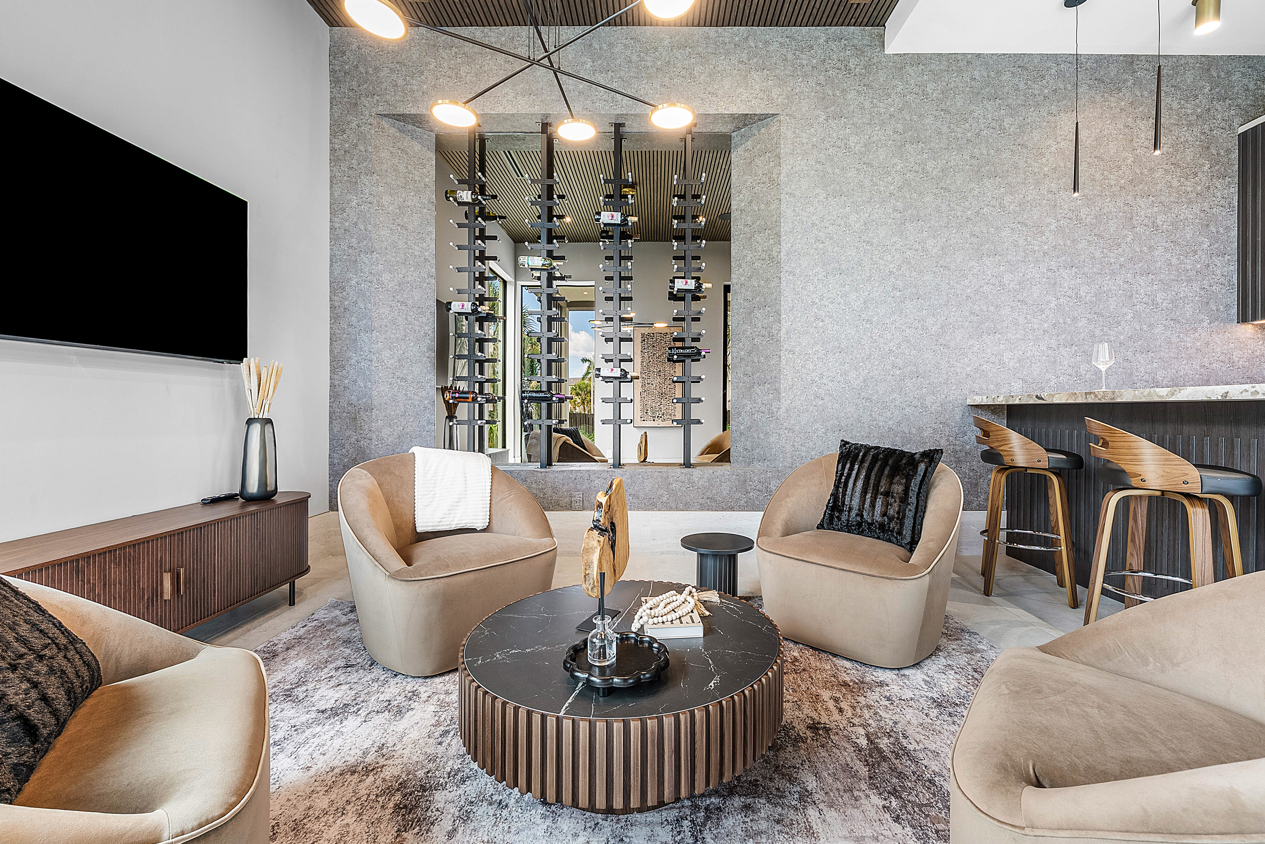 Glass-enclosed wine room with bottle display by RG Glass