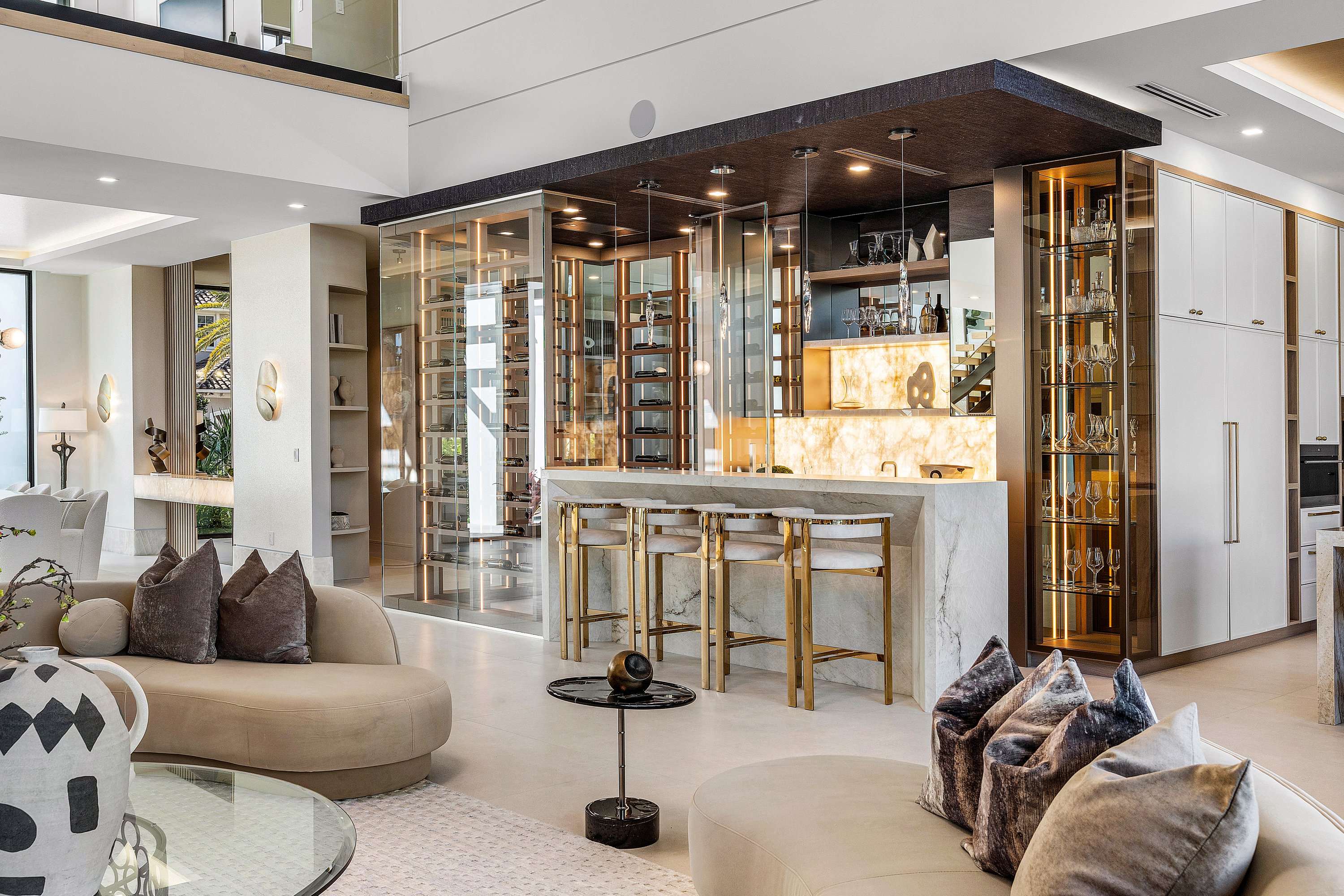 Glass-enclosed wine cellar with full bottle storage by RG Glass