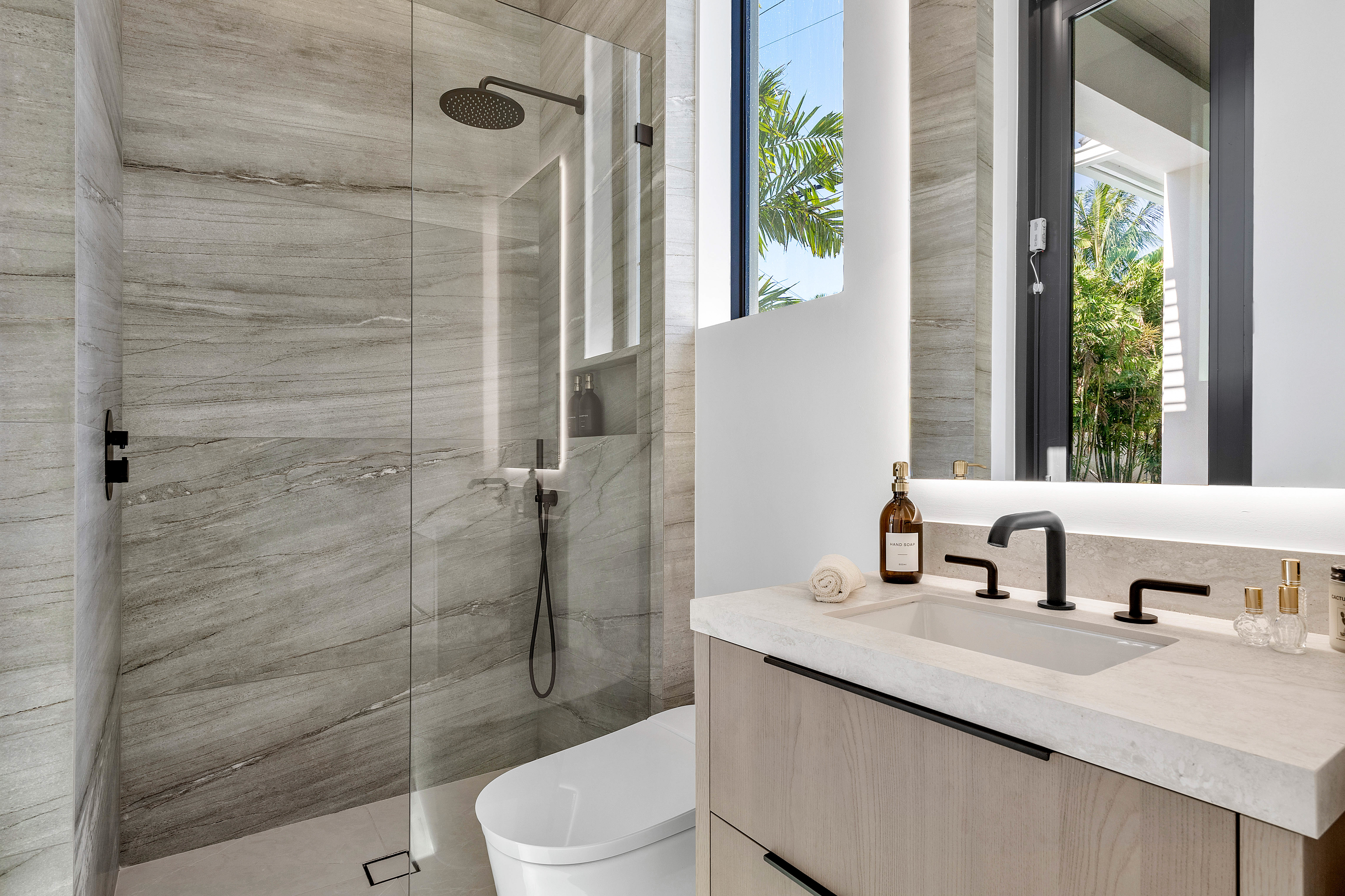 Frameless glass shower enclosure by RG Glass