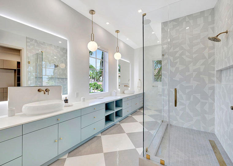 Modern bathroom with frameless shower glass by RG Glass