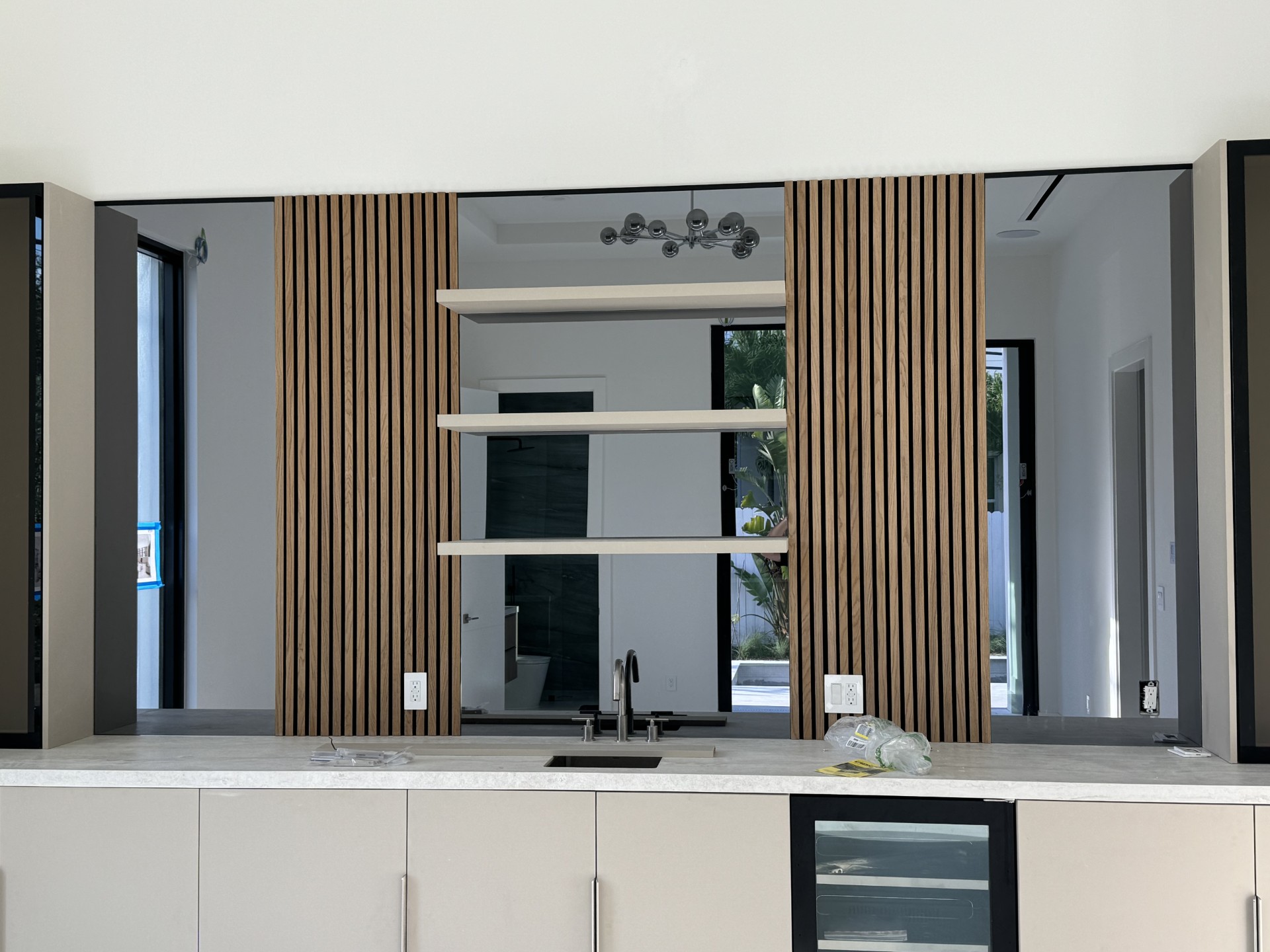 Custom mirror accent wall by RG Glass