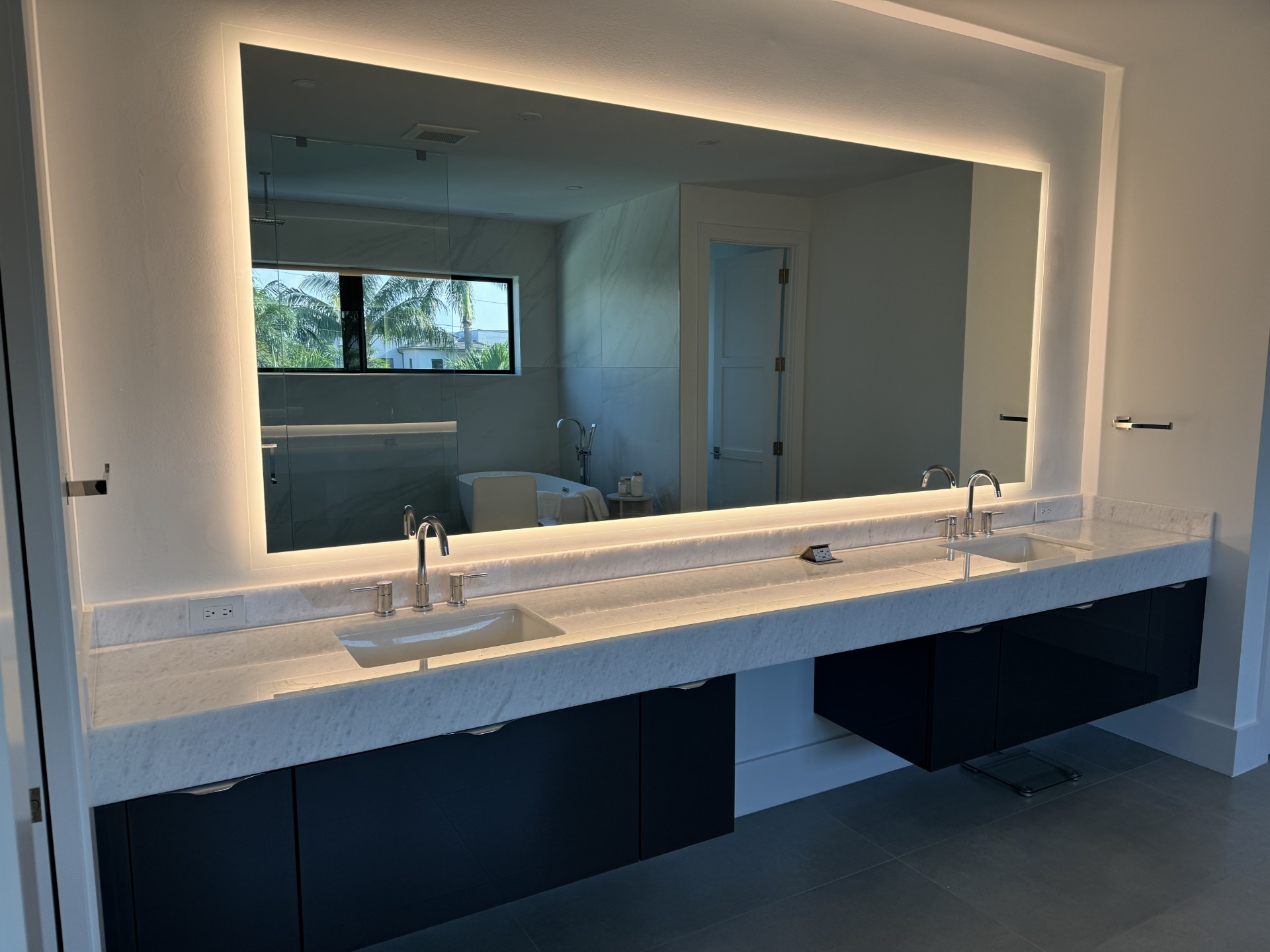 Custom wall mirror installed in a South Florida interior